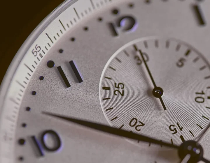Detail of a chronograph dial showing sub-registers and a tachymeter scale