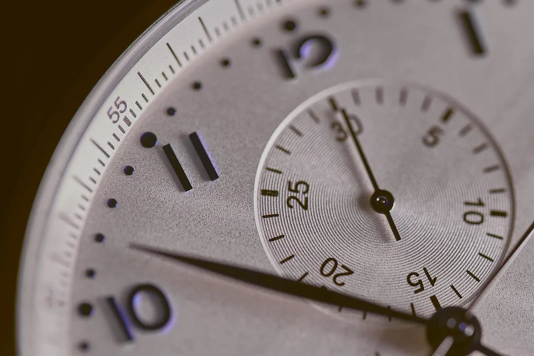 Detail of a chronograph dial showing sub-registers and a tachymeter scale