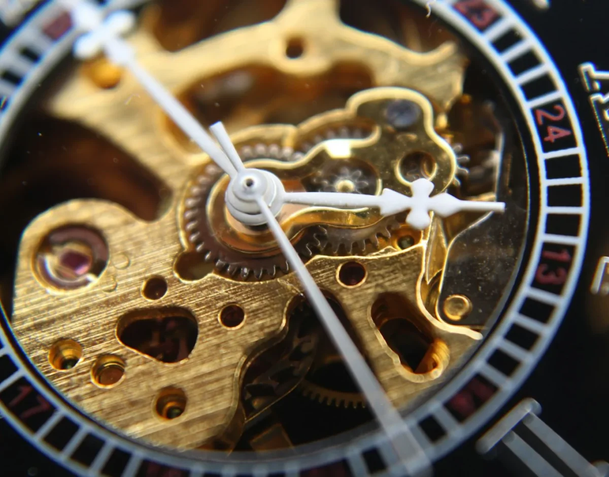 Skeleton dial showing the gilded gear train of an automatic movement
