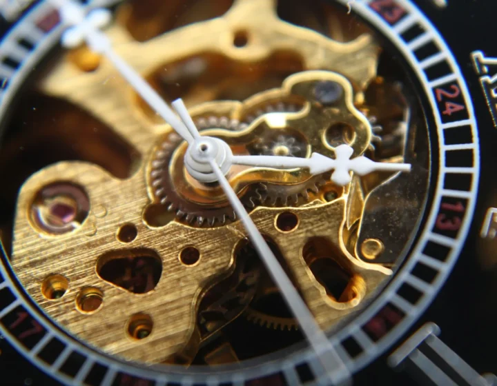 Skeleton dial showing the gilded gear train of an automatic movement