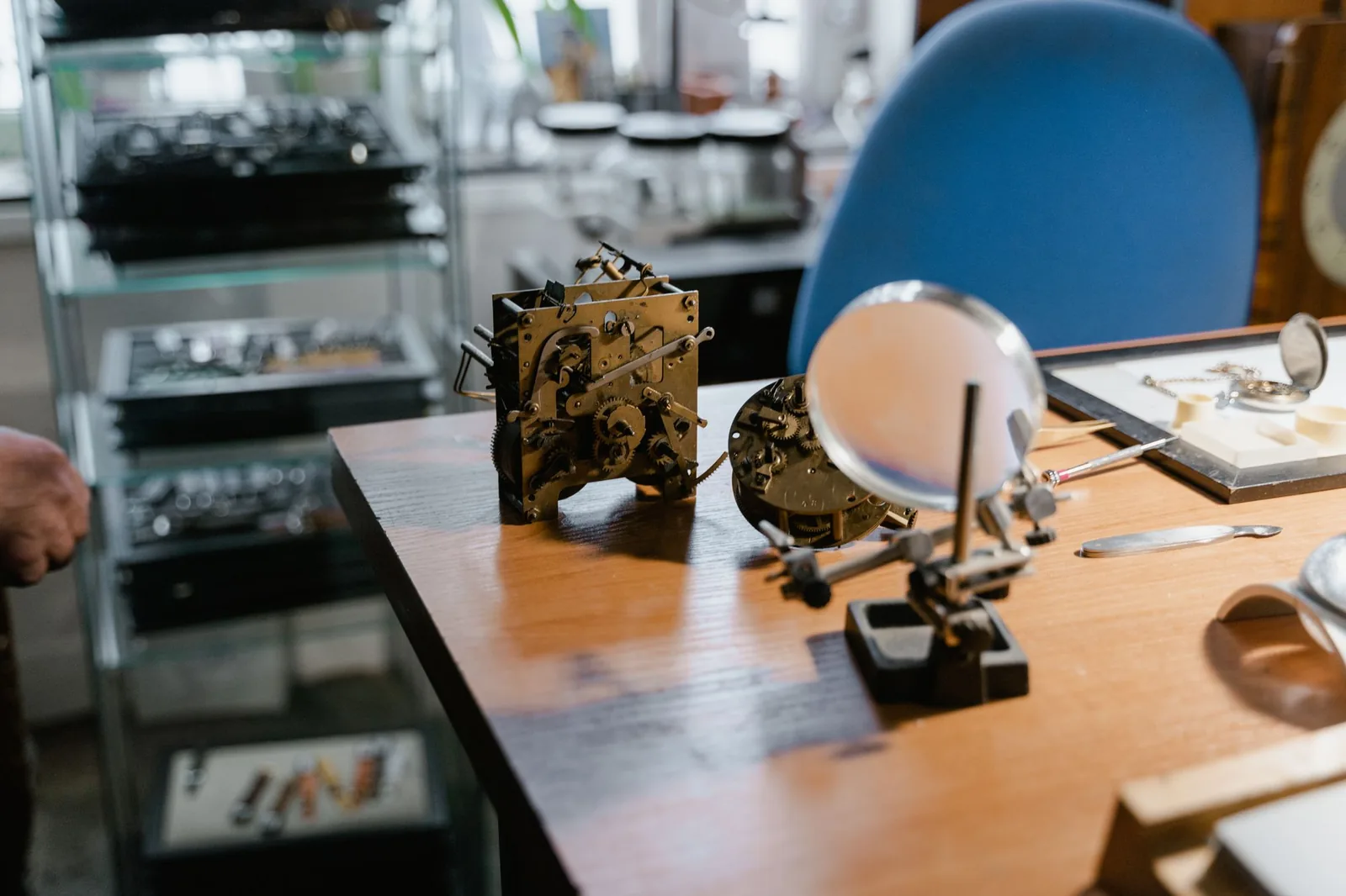 Movements on a bench in a watch repair workshop