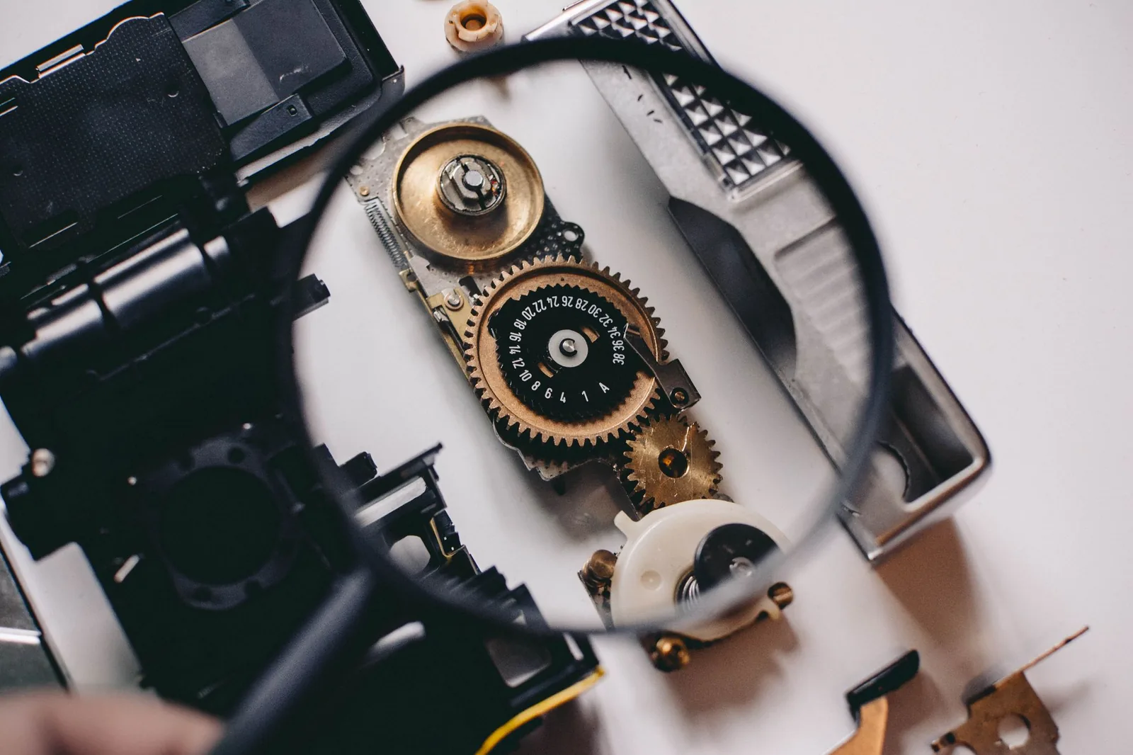 The brass gears of a fine mechanism, magnified