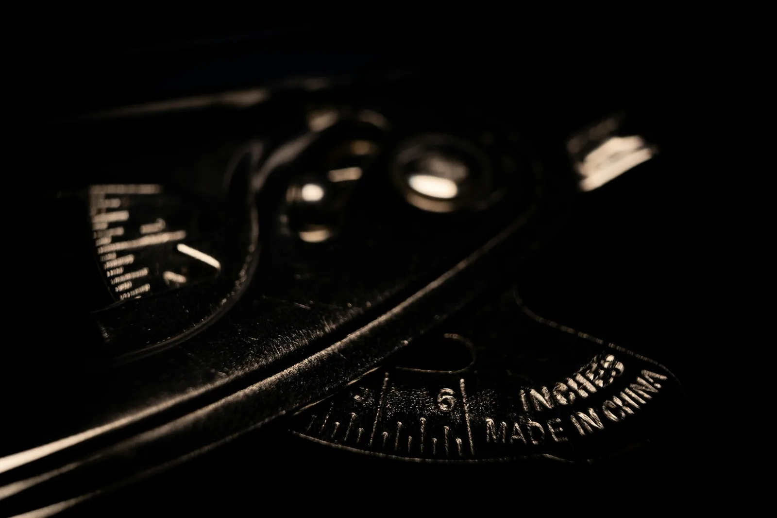 The engraved case back of a wristwatch showing serial and reference markings