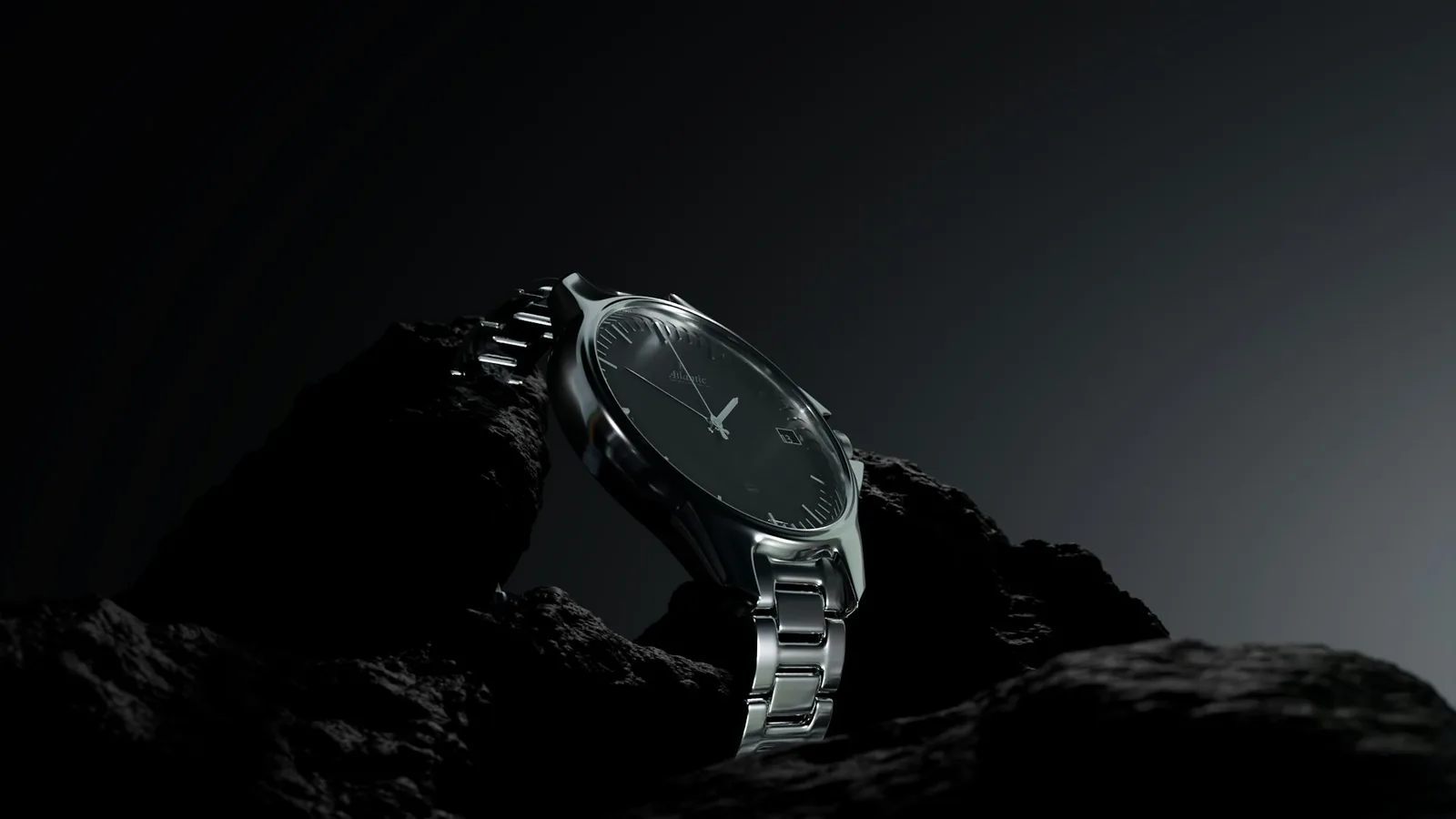A steel bracelet watch held in the hand to judge its weight