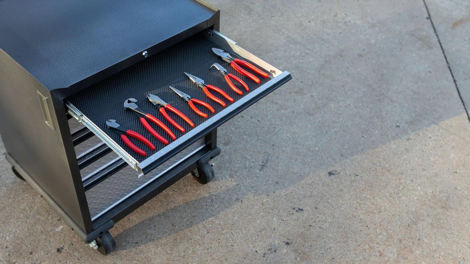 Small labelled drawers of tools in a workshop